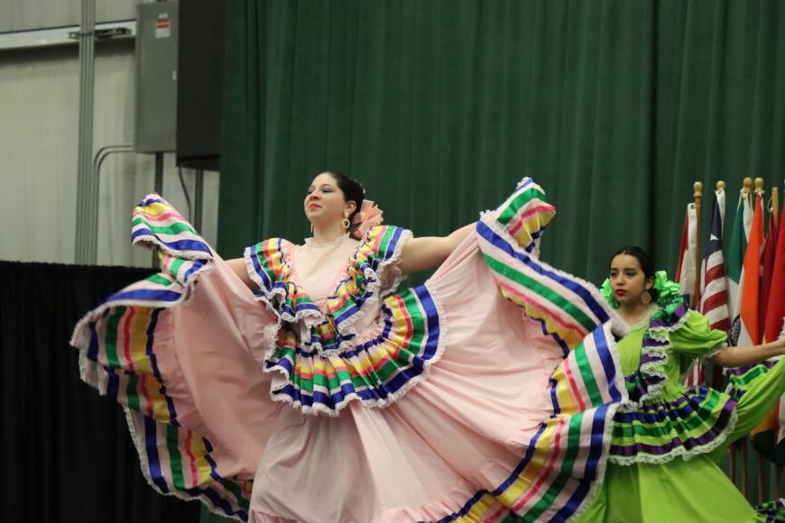 a female mexican dancer performing on stage